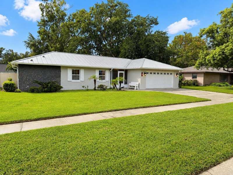 3 bedroom Single Family Residence at 7640 Village Green Dr, Village Green, Winter Park — photo 1