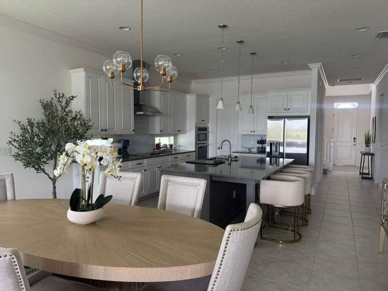 5 bedroom Single Family Residence at 13713 Larkton Lane, Eagle Crk Village J & K Ph 2B1, Orlando — photo 4