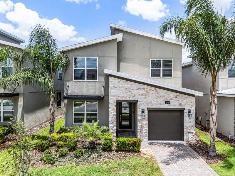 5 bedroom Single Family Residence at 661 Drop Shot Drive, Championsgate, Stoneybrook, Davenport — photo 2