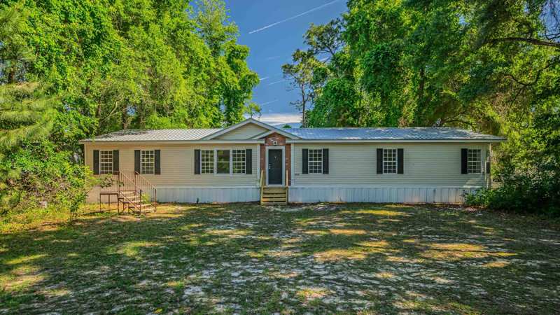 5 bedroom ManufacturedHome at 2728 Juncture Drive, Natural Wells Unit 4, Tallahassee — photo 1
