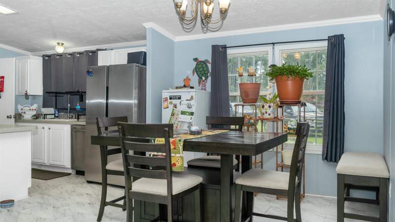 4 bedroom ManufacturedHome at 780 NE Condurango Lane, River Highlands, Lee — photo 3