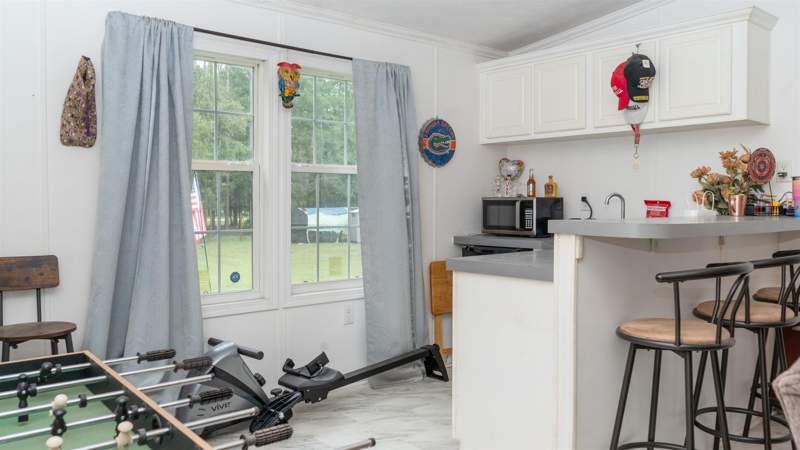 4 bedroom ManufacturedHome at 780 NE Condurango Lane, River Highlands, Lee — photo 4