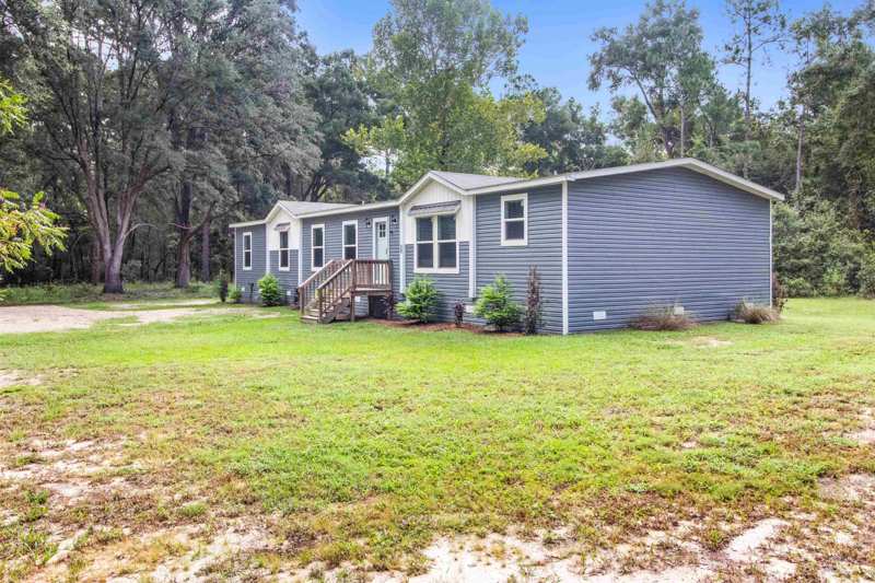 4 bedroom ManufacturedHome at 59 Sink Dr, Bull Sink, Crawfordville — photo 1
