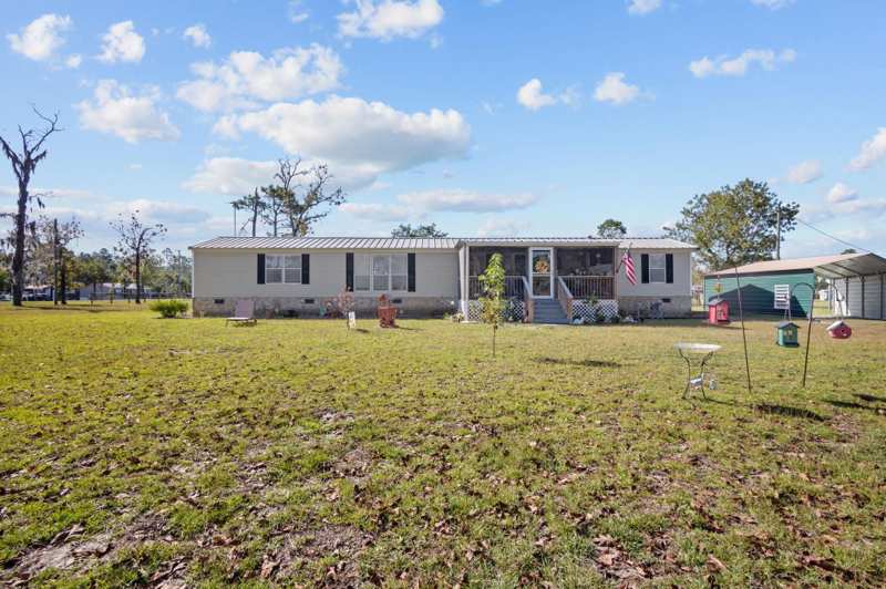 3 bedroom ManufacturedHome at 15680 E Royal Oak Dr, Adams Beach Cove, Perry — photo 1
