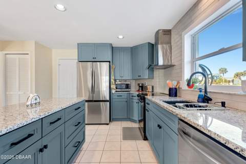 103 Peninsula Winds Drive, Ormond Beach FL - photo 7 of 57