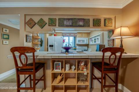 944 S Peninsula Drive #102, Daytona Beach FL - photo 7 of 53