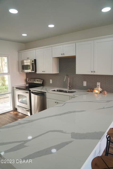 719 S Beach Street #103, Daytona Beach FL - photo 7 of 65