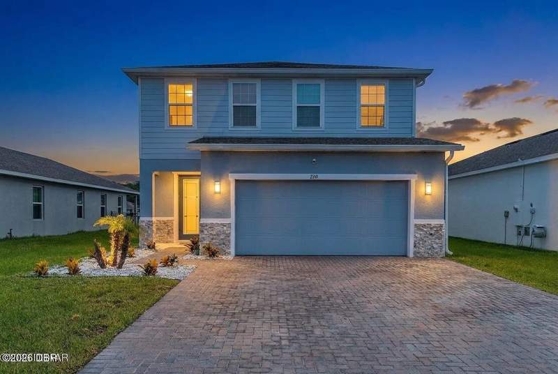5 bedroom Single Family Residence at 210 Eagle Harbor Way, Preserve at Lpga, Daytona Beach — photo 2