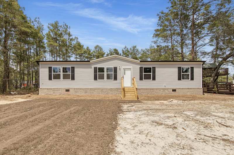 4 bedroom Manufactured Home at 28 W White Rose Street, Oakwood Hills Unit III, DeFuniak Springs — photo 1