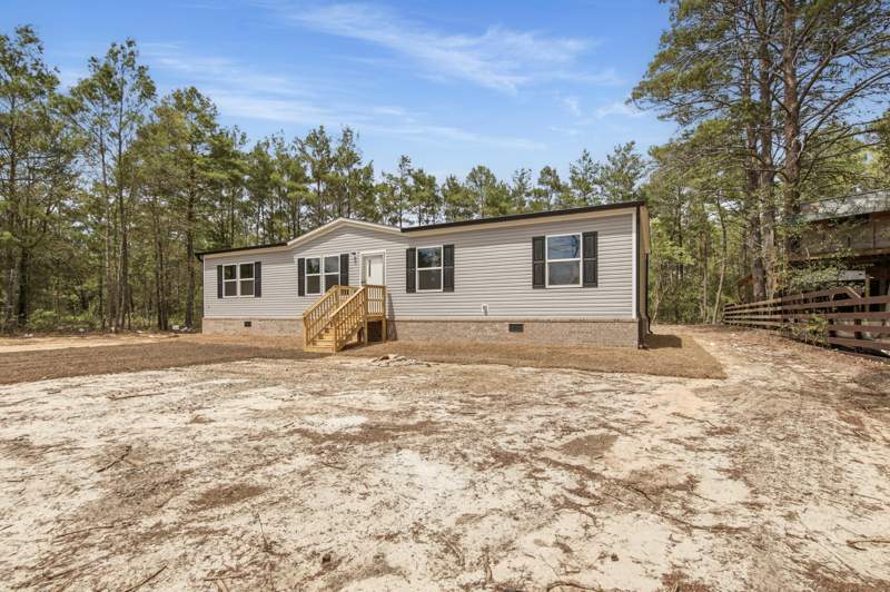 4 bedroom Manufactured Home at 28 W White Rose Street, Oakwood Hills Unit III, DeFuniak Springs — photo 3