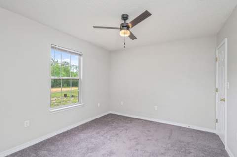 259 W Cypress Avenue, DeFuniak Springs FL - photo 7 of 29