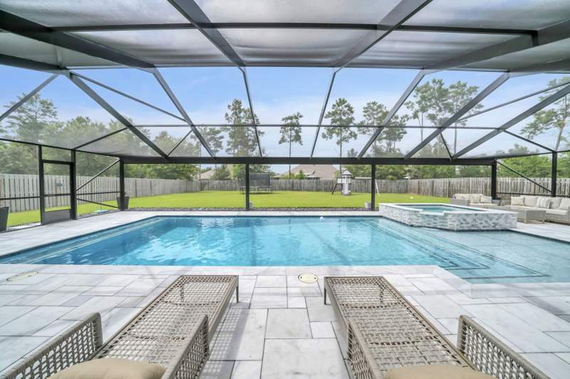 4 bedroom Detached Single Family at 355 Mill Pond Cove, Hammock Bay, Freeport — photo 2