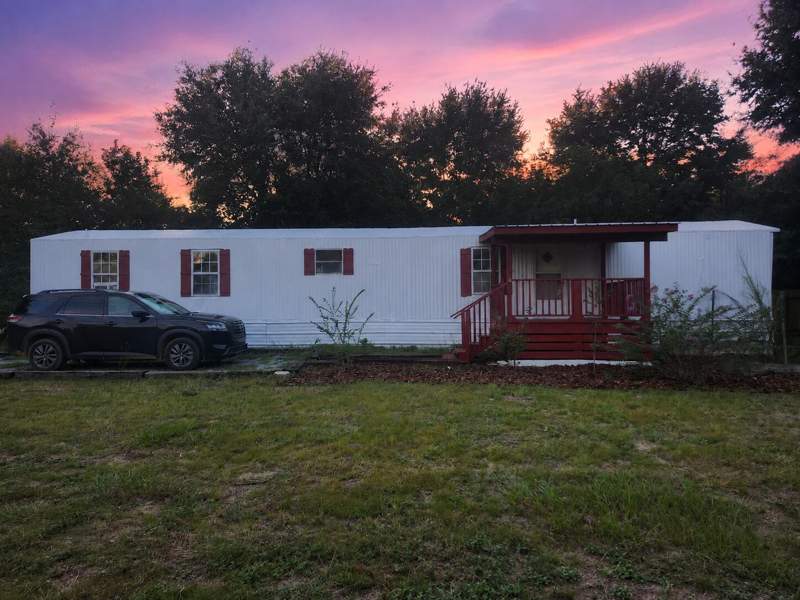 2 bedroom Mobile Home at 221 Leonardo Lane, Oakwood Lakes Estates Unit 7, DeFuniak Springs — photo 2