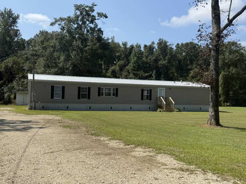 3 bedroom Mobile Home at 1150 Reeves Road, Metes & Bounds, Baker — photo 1