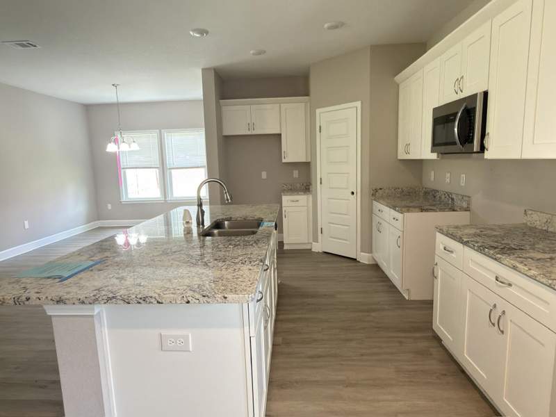 4 bedroom Detached Single Family at 1509 Long Needle Court, Piney Woods Est, Baker — photo 4