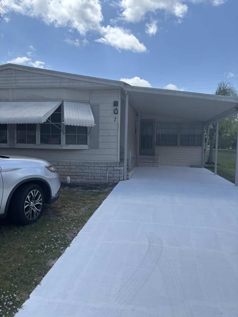 2 bedroom Manufactured Home at 7 Villa Flores, Spanish Lakes Golf Village, Port St. Lucie — photo 1