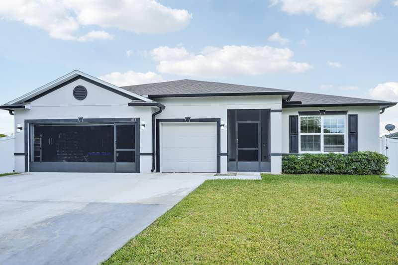 4 bedroom Single Family Residence at 684 SW Jada Road, Port St Lucie Section 21, Port St. Lucie — photo 1