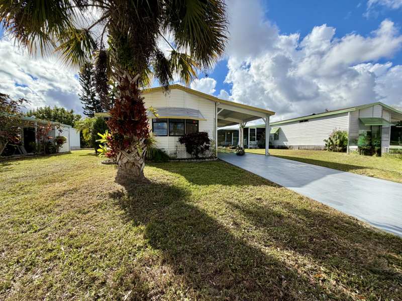 2 bedroom Manufactured Home at 14463 Dalia Avenue, Spanish Lakes Fairways, Fort Pierce — photo 1