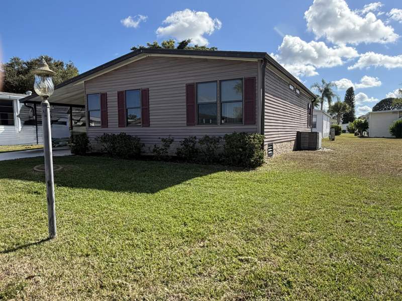 2 bedroom Manufactured Home at 13975 Clavell Avenue, Spanish Lakes Fairways, Fort Pierce — photo 2