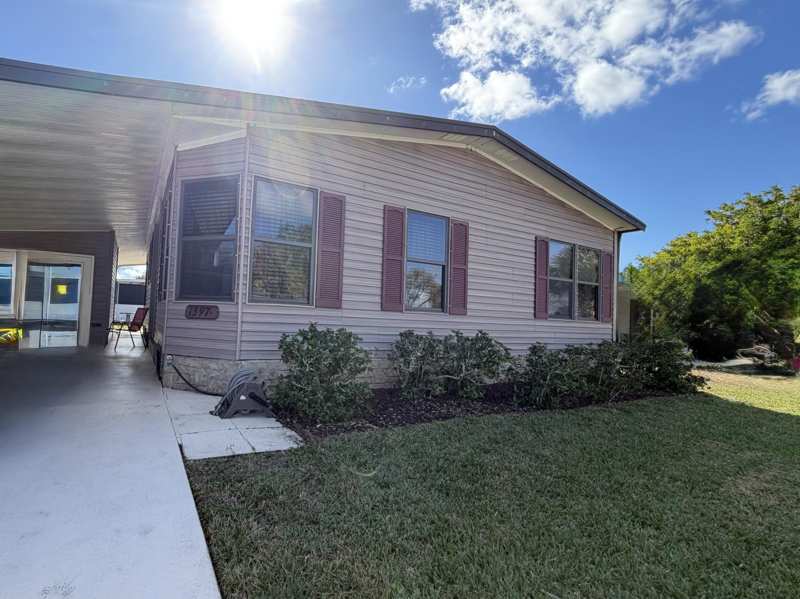 2 bedroom Manufactured Home at 13975 Clavell Avenue, Spanish Lakes Fairways, Fort Pierce — photo 1