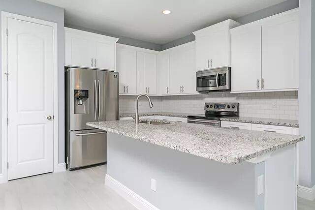 4 bedroom Single Family Residence at 3673 SW Masilunas Street, Port St Lucie Section 19, Port St. Lucie — photo 2