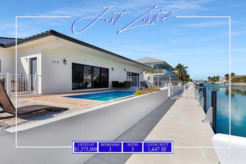3 bedroom Half Duplex at 230 Sadowski Causeway, Marina Sub (54.0), Key Colony — photo 1