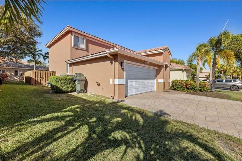 4 bedroom Single Family Residence at 4647 Waycross Drive, Banyan Trails, Coconut Creek — photo 2