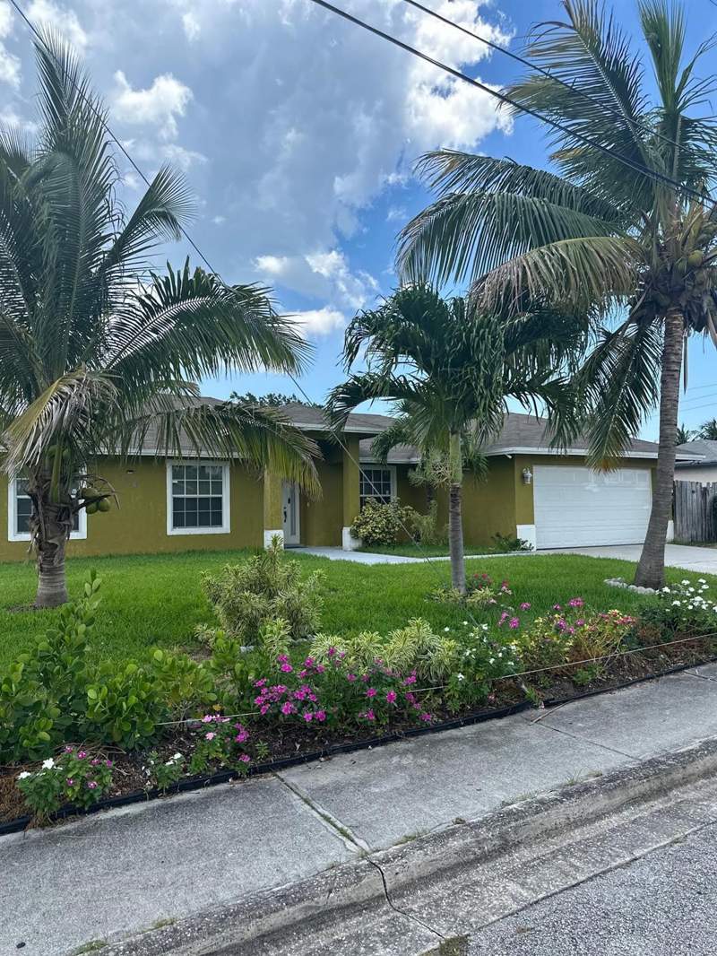 4 bedroom Single Family Residence at 1618 W 26th Street, Davis Sub, Riviera Beach — photo 2