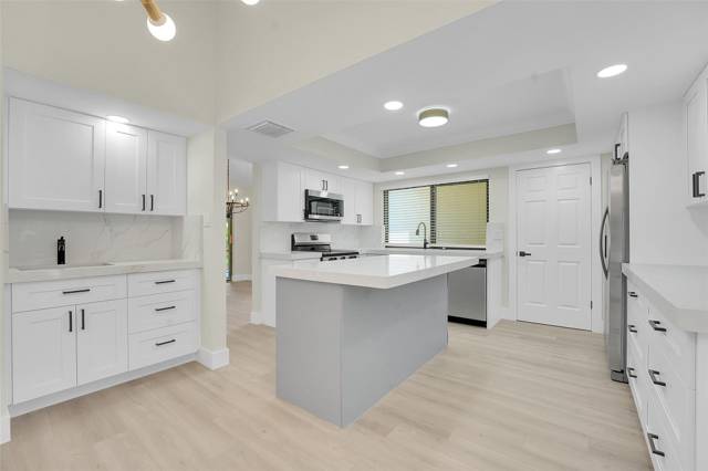11457 Shady Oaks Lane, home for sale in North Palm Beach