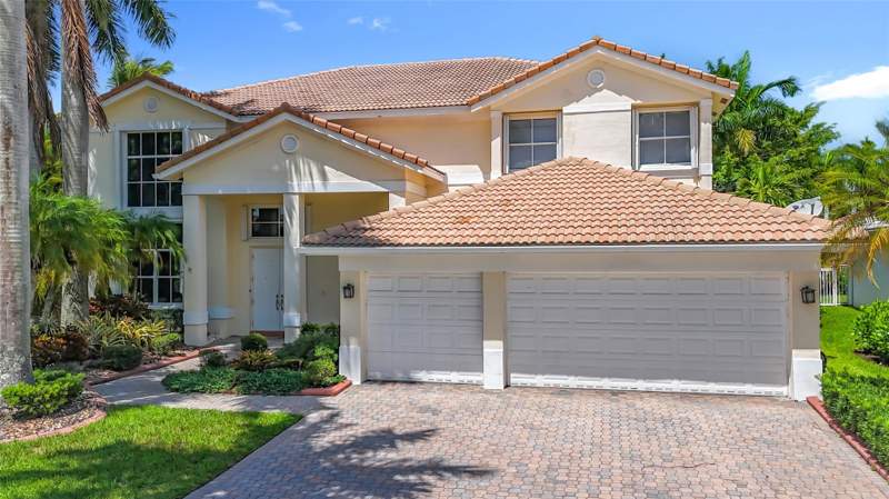 5 bedroom Single Family Residence at 1673 Victoria Pointe Circle, Sector 7-Parcel W, Weston — photo 5