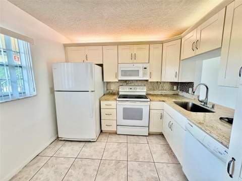 3905 N Nob Hill Road #201, Sunrise FL - photo 7 of 32