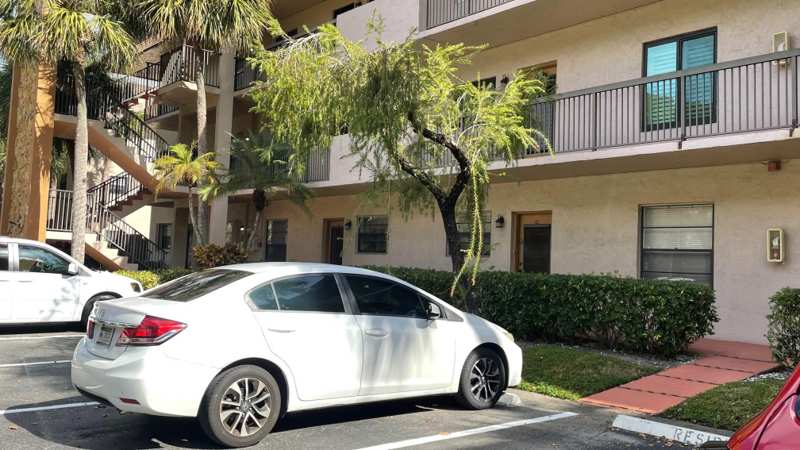 2 bedroom Condominium at 6080 N Sabal Palm Boulevard #103, Lake of Carriage Hills, Tamarac — photo 1