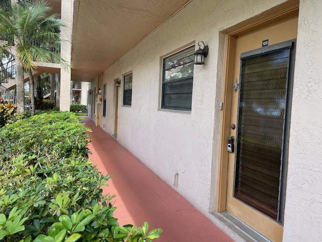 2 bedroom Condominium at 6080 N Sabal Palm Boulevard #103, Lake of Carriage Hills, Tamarac — photo 2