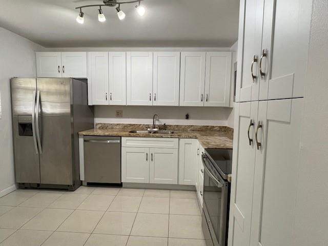 2 bedroom Condominium at 6080 N Sabal Palm Boulevard #103, Lake of Carriage Hills, Tamarac — photo 5