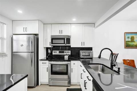 3120 Holiday Springs Boulevard #106, Margate FL - photo 22 of 56