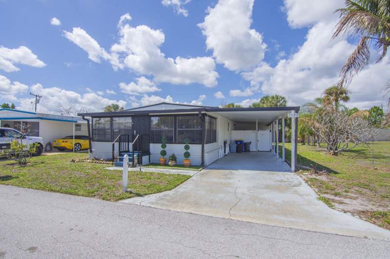 2 bedroom Manufactured Home at 2520 SE Penny Lane, Leisure Village Mobile Hm Pk Unrec Co-Op, Stuart — photo 2