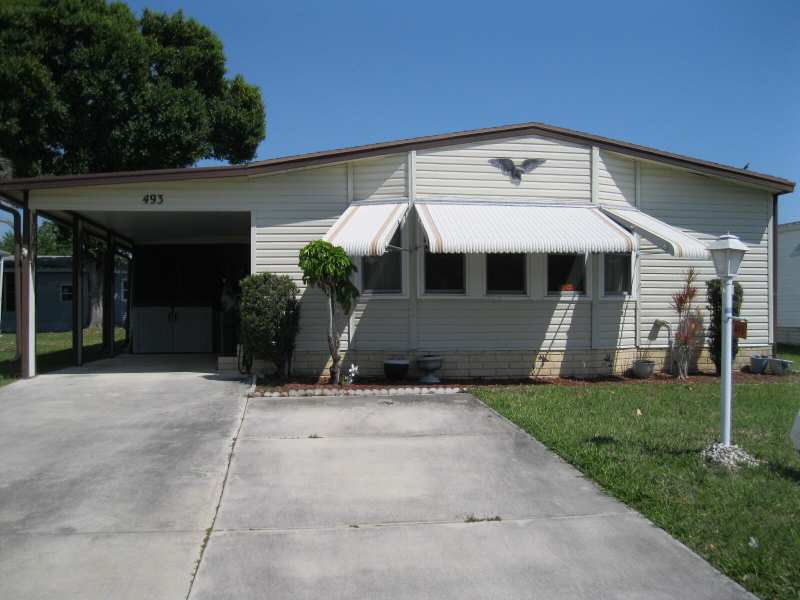 2 bedroom Manufactured Home at 493 Hemingway Terrace, Tropical Isles, Fort Pierce — photo 1