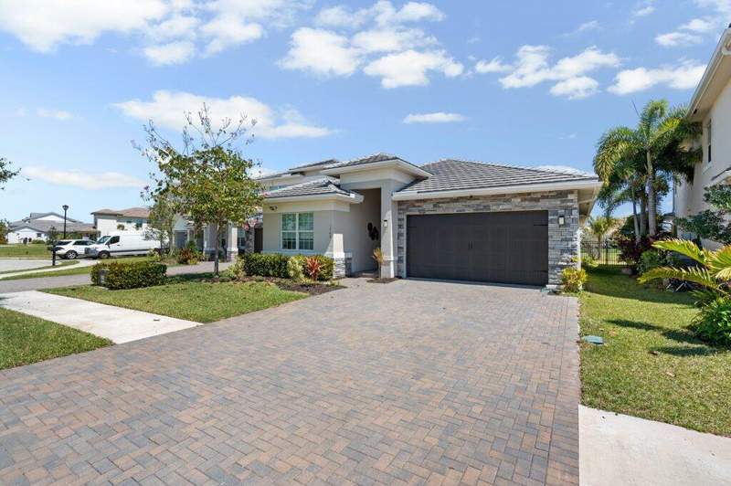 4 bedroom Single Family Residence at 1362 Harvester Crossing, Arden Pud Pod G South, Loxahatchee — photo 3