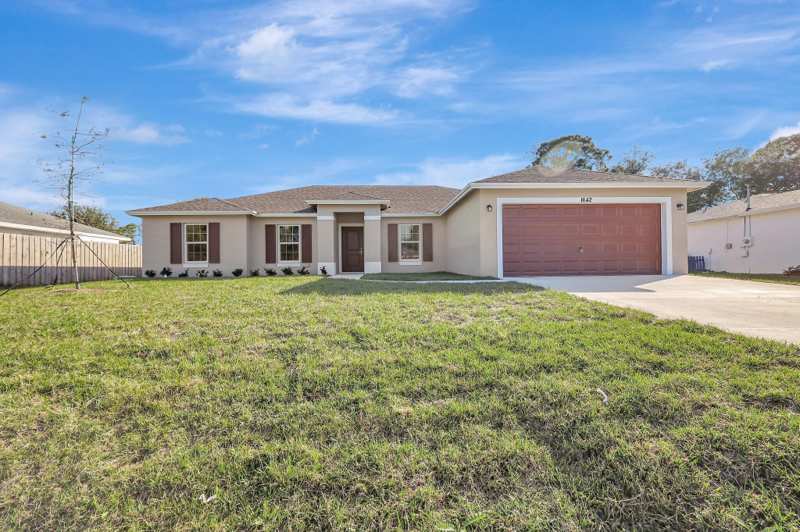 4 bedroom Single Family Residence at 3965 SW Mccain Street, Port St Lucie Section 21, Port St. Lucie — photo 1