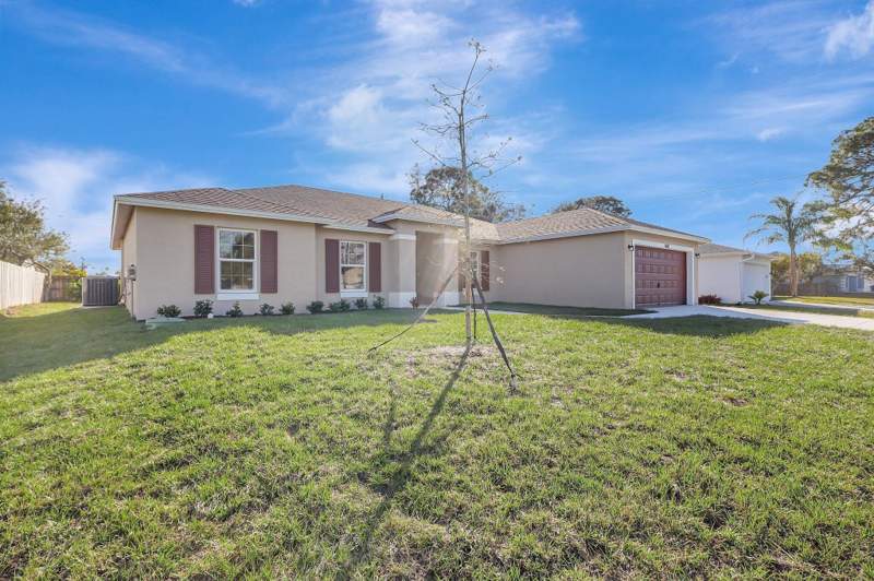 4 bedroom Single Family Residence at 3965 SW Mccain Street, Port St Lucie Section 21, Port St. Lucie — photo 2