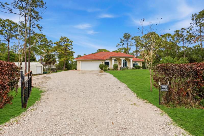 4 bedroom Single Family Residence at 15327 64th Place, 31-42-41~ W 204.6 Ft Of E 1736.8 Ft Of S 242.9 Ft, The Acreage — photo 2