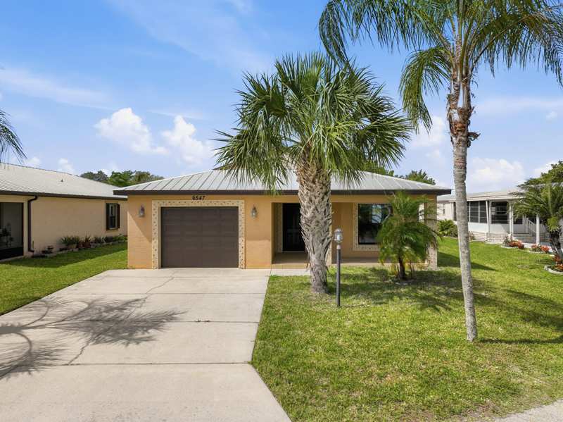 2 bedroom Single Family Residence at 6547 Zapote Court, Spanish Lakes Fairways Leasehold Estates, Fort Pierce — photo 1