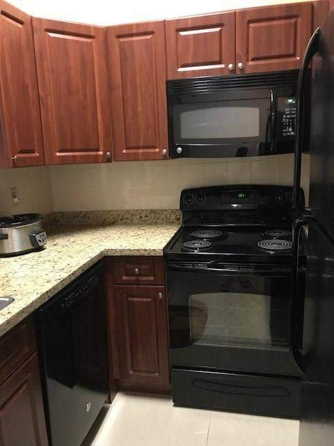 1 bedroom Condominium at 651 Lyons Road #10-203, Coco Parc, Coconut Creek — photo 2