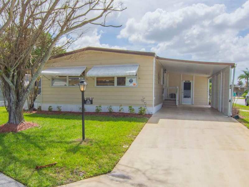 2 bedroom Manufactured Home at 225 NE Forrest Court, Pinelake Village, Jensen Beach — photo 1