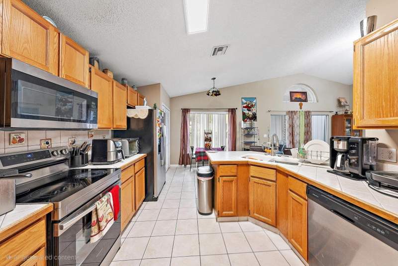 3 bedroom Single Family Residence at 119 Hammocks Drive, River Bridge 2, Greenacres — photo 3