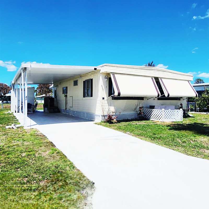 2 bedroom Manufactured Home at 42 SE Spanish Way, Spanish Lakes One, Port St. Lucie — photo 1