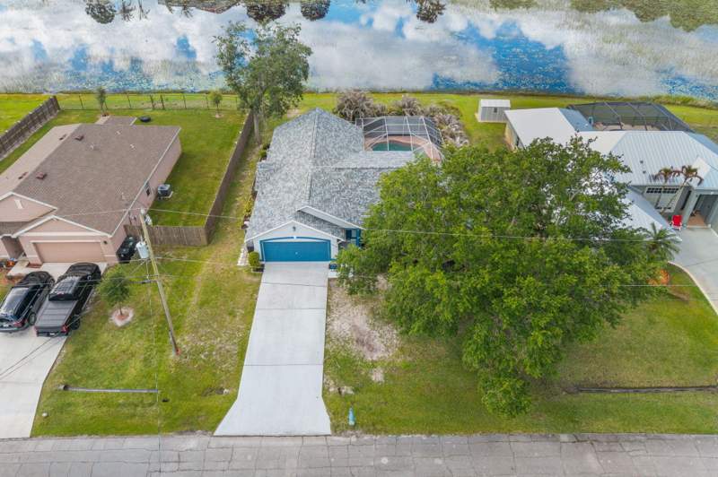 4 bedroom Single Family Residence at 5930 NW Theda Lane, Port St Lucie Section 48 1st Replat, Port St. Lucie — photo 2