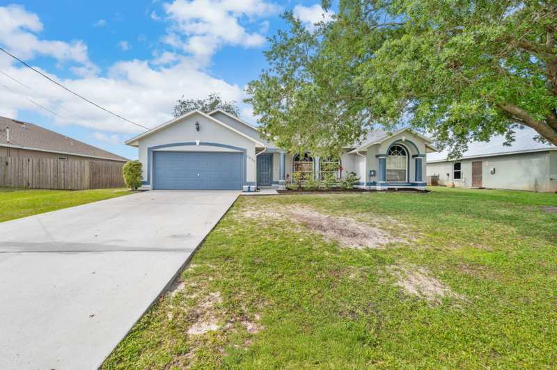 4 bedroom Single Family Residence at 5930 NW Theda Lane, Port St Lucie Section 48 1st Replat, Port St. Lucie — photo 1