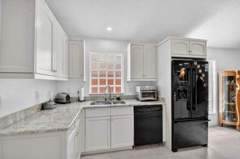 1084 Aspri Way, Riviera Beach FL - photo 13 of 78