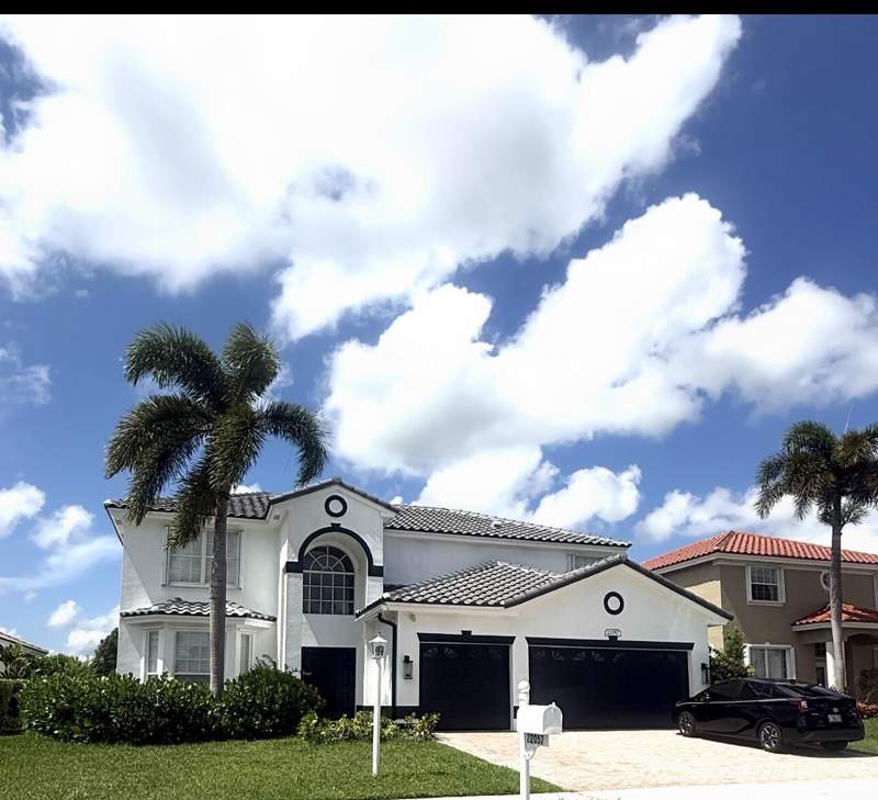 4 bedroom Single Family Residence at 22057 Palm Grass Drive, Boca Winds Par E, Boca Raton — photo 2